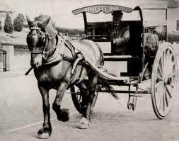 This picture shows an original Ringtons delivery by horse and cart
