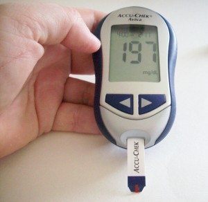 an acu reed diabetes monitor showing the reading as 197