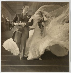 a black and white photo of a wedding couple