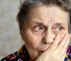 elderly woman looking confused