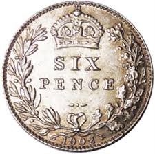 this image shows an old silver sixpence