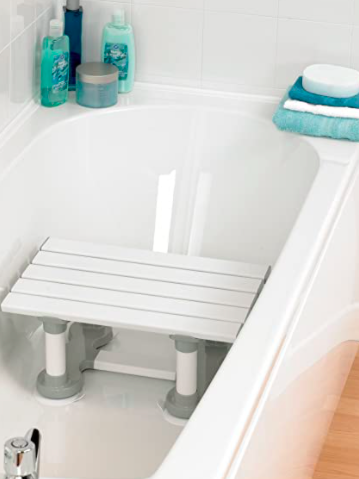 This shows a slatted bath seat with suction pads