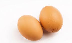 this image shows two eggs with shells on