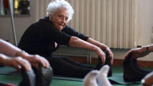 this image shows an elderly lady exercising
