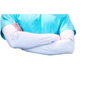 this image shows a person with folded arms wearing a blue top.