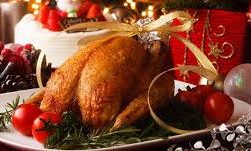 This image shows a whole turkey on a platter for Christmas