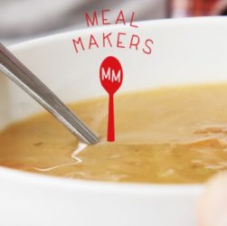 this image shows a bowl of soup and a meal makers logo