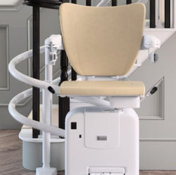this image shows a stair lift that works well with a curved staircase.