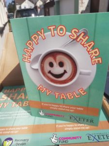 this image shows a card saying "Happy to Share" my table 