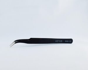 Permanent Hair Removal. Image simply shows a pair of black tweezers