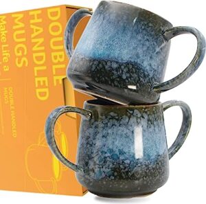 This post is about double handled mugs. This image shows two beautiful mottled blue stoneware mugs with a handle on each side. There is an orange box with yellow writing behind them. The writing on it says Double handled mugs make life a ....