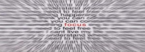 a very blurred piece of text with the only word in focus being focus in red