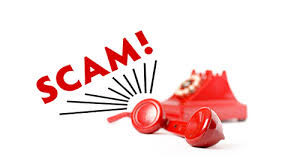 this image shows a red phone and the word scam