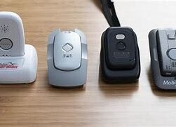 this image shows a selection of medical alert systems. They are wearable devices to press when help is needed